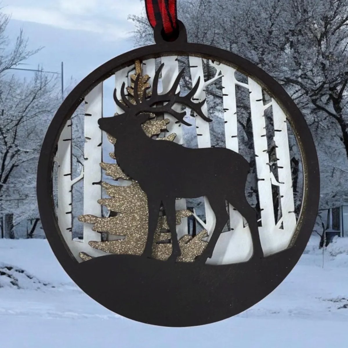Set of layered wood ornaments with winter woodland animal designs