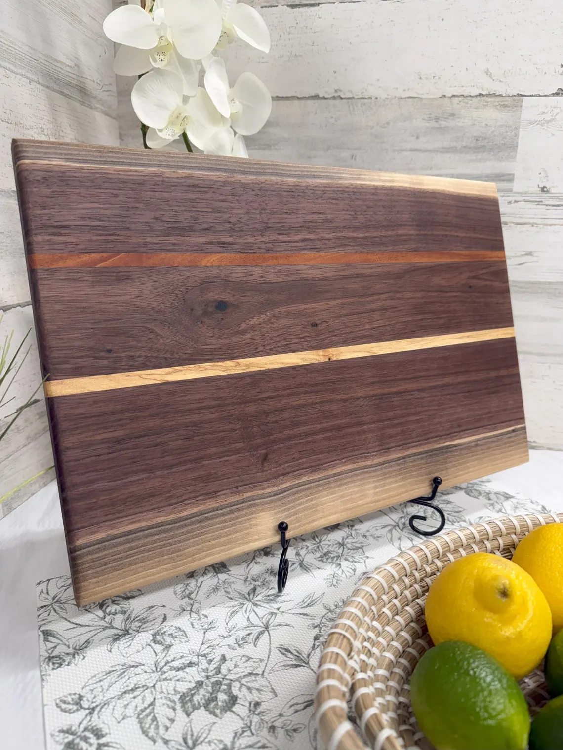 Black walnut cutting board with a thin maple accent stripe