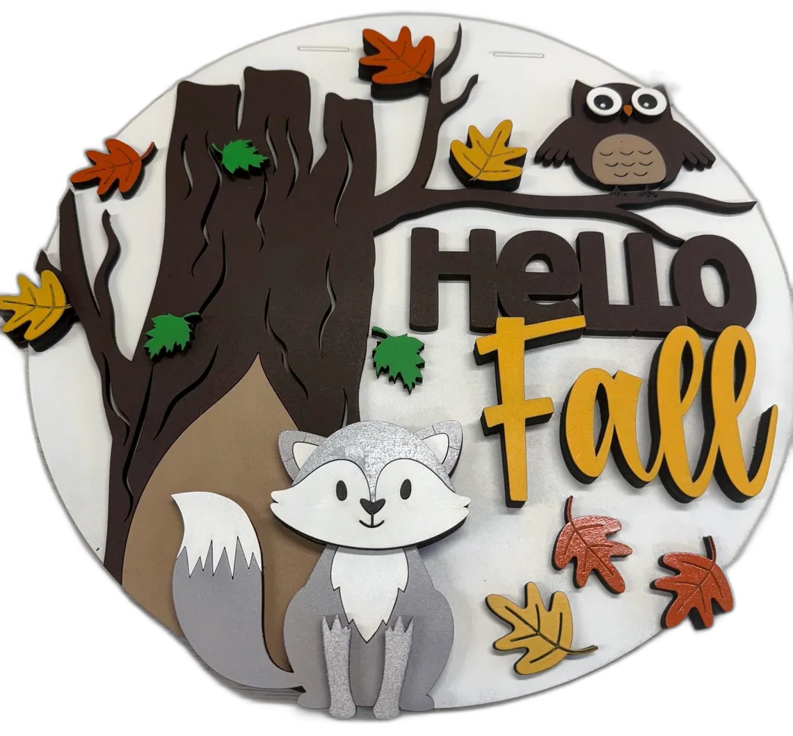 Round wood sign with a fox, owl, bare tree, and 'Hello Fall' lettering