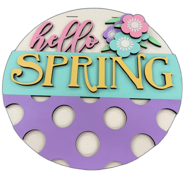 Round wood sign with pastel flowers, polka dots, and 'Hello Spring' lettering