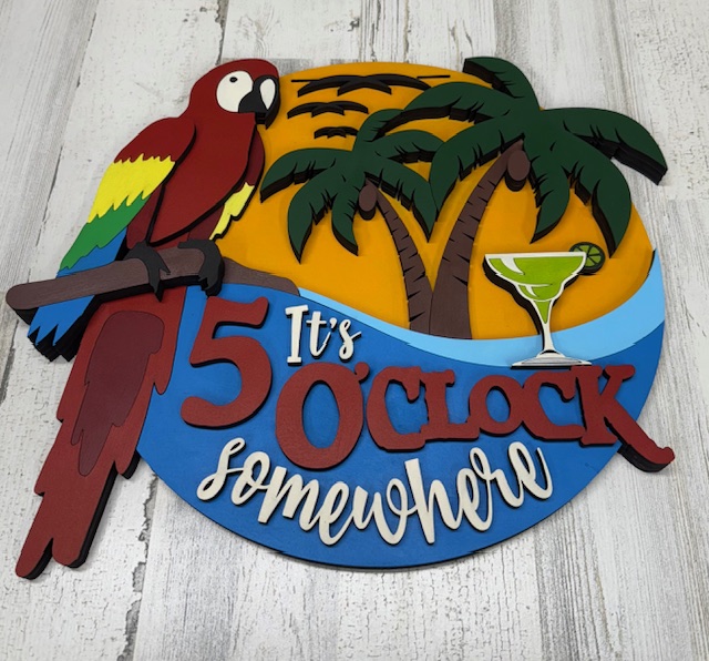 Custom wood sign featuring a parrot and palm trees with 'It's 5 O'Clock Somewhere' text